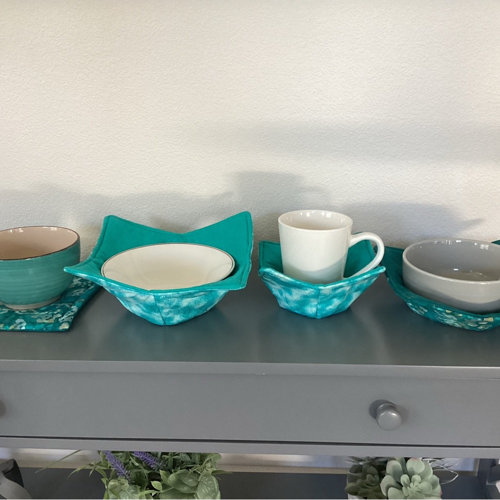 Turquoise and various colors of microwave bowl cozies